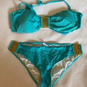 Trina Turk turquoise two piece with gold accents
